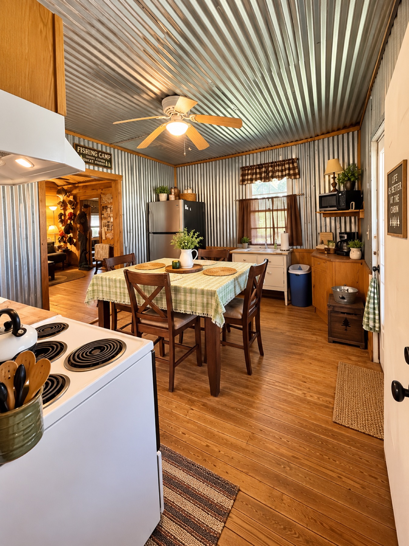 Cabin kitchen and dining space viewed from the stove